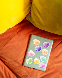 Overpowered Protagonist Candy Heart Sticker